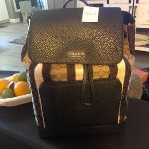 Coach Turner Backpack. Signature jacquard and pebble leather.